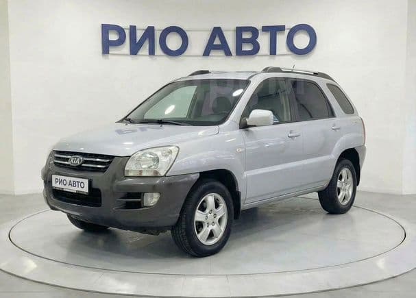 Kia Sportage — фото 1